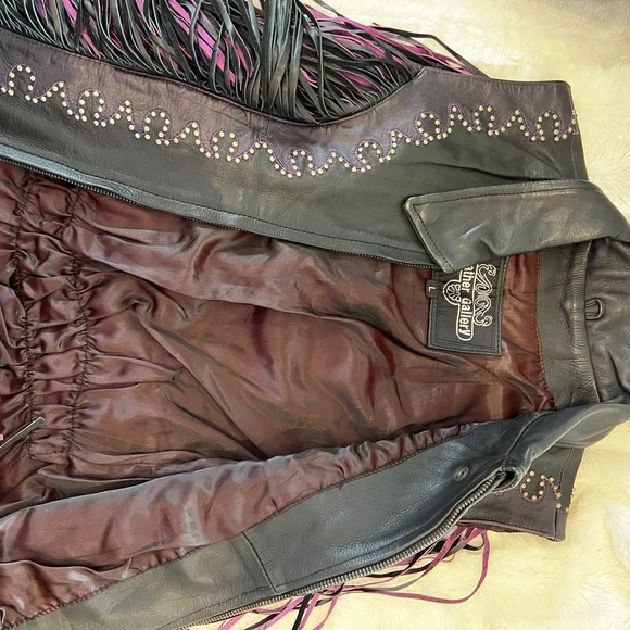 Leather black and purple vest. Fits like a medium although labeled a large. - Picture 7 of 7